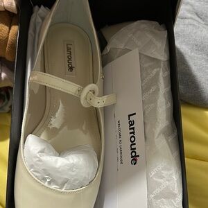 Larroude Cream Flats with Classic Mary Jane Style